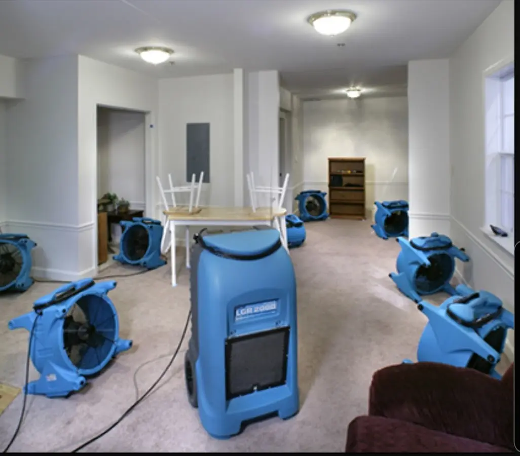 Air movers and dehumidifier setup for Water Extraction & Removal in Rogers